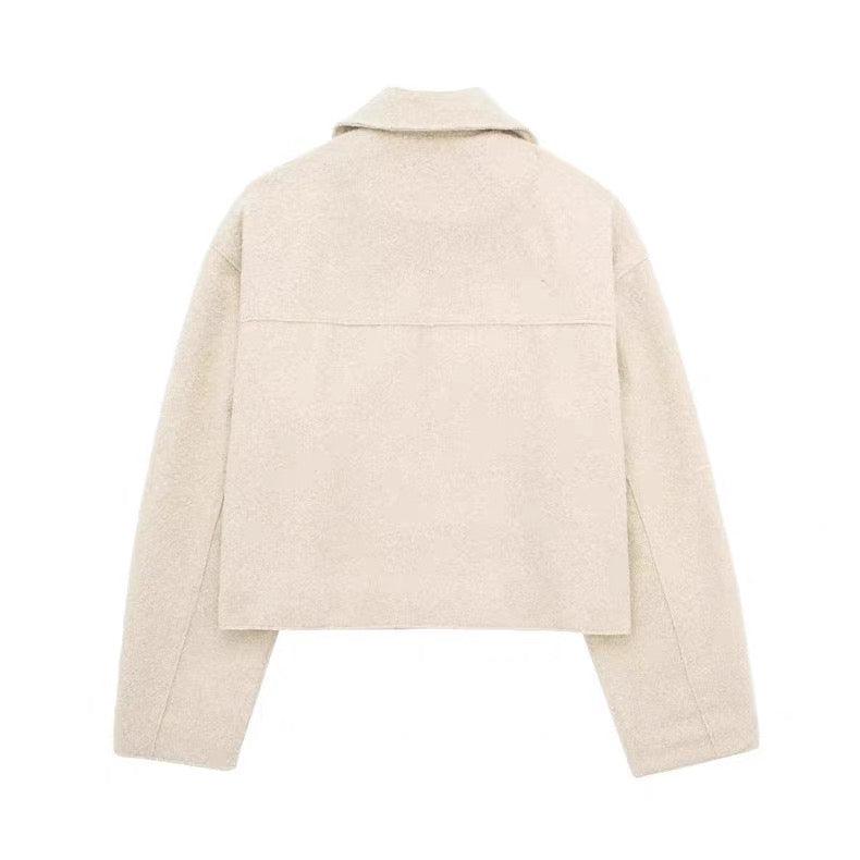 La Grise Élégance -
Wolljacke mit Reißverschluss und Brusttaschen